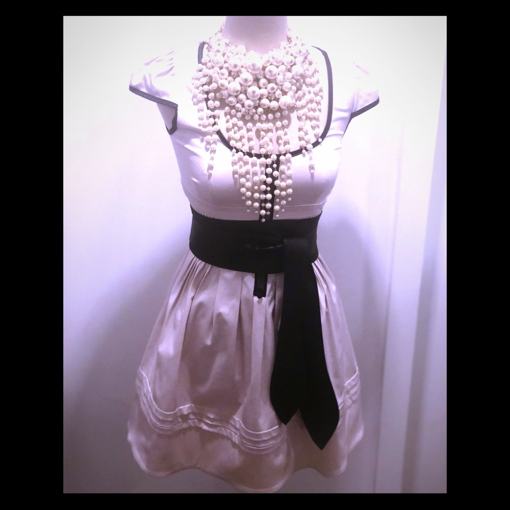 Corset top scoop neck pink dress with cap sleeve and flare bottom